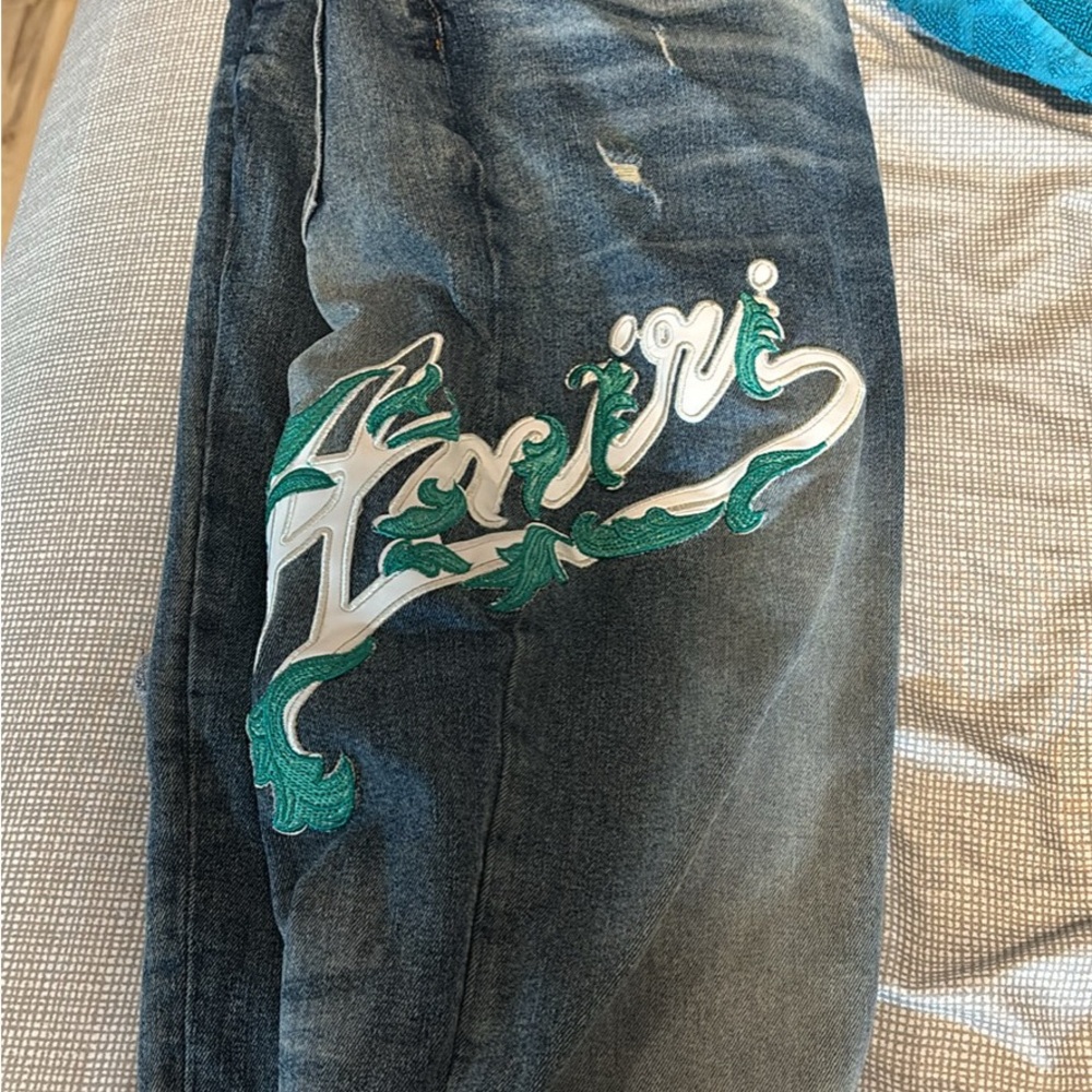 AMIRI Blue Jeans with Green and White Embroidery